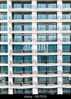 Symmetrical facade of a contemporary high-rise building with repeating balconies located in Sunny Beach, Burgas Stock Photo