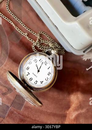 pocket watch on a desk Stock Photo