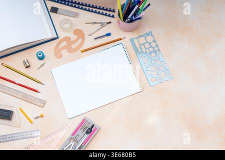 Drawing Tools and Notebook Flat Lay background. Various draw instruments for school or engineering. Desk top view copy space Stock Photo