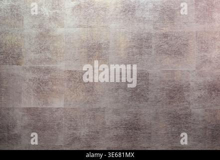Muted gray-brown textured surface with subtle grainy patterns. Perfect for backgrounds, design overlays, or architectural concepts Stock Photo