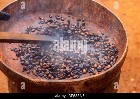 Roasted coffee beans in a rustic bowl Stock Photo