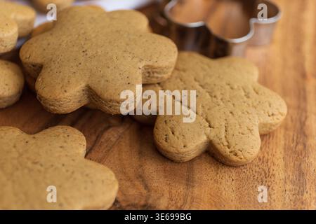 Detailed close-up of freshly baked gingerbread cookies with soft texture and golden color. Traditional homemade pastry concept Stock Photo