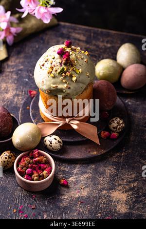 Traditional Easter cake kulich with pistachio Stock Photo