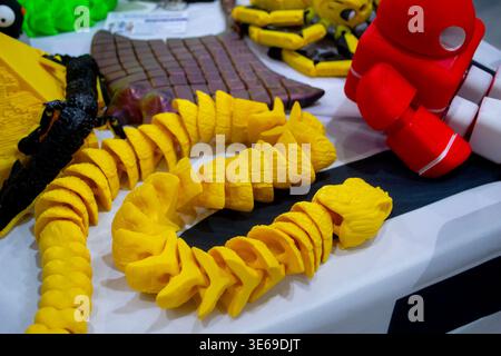 3D printed many different art objects. Objects printed on 3D printer from melted colored plastic. Models created on 3D printer from threads of molten plastic. Modern additive progressive technologies Stock Photo