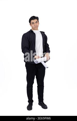 Young businessman standing and holding a folder Stock Photo