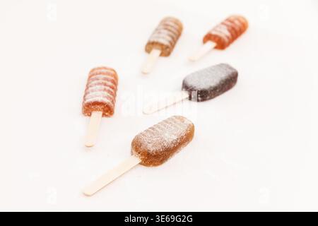 Yummy candied fruit jelly like a ice cream on white background Stock Photo