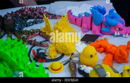 3D printed many different art objects. Objects printed on 3D printer from melted colored plastic. Models created on 3D printer from threads of molten plastic. Modern additive progressive technologies Stock Photo