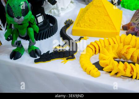3D printed many different art objects. Objects printed on 3D printer from melted colored plastic. Models created on 3D printer from threads of molten plastic. Modern additive progressive technologies Stock Photo