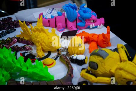 3D printed many different art objects. Objects printed on 3D printer from melted colored plastic. Models created on 3D printer from threads of molten plastic. Modern additive progressive technologies Stock Photo