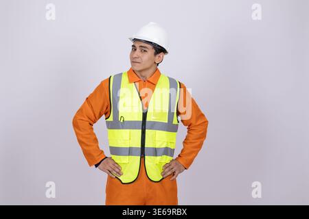 Builder in safety gear looking at the camera Stock Photo