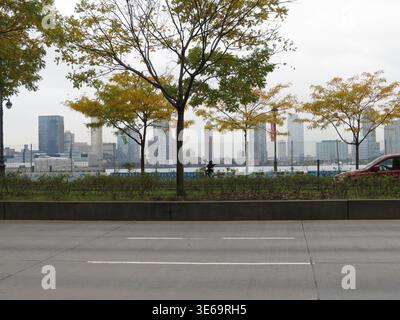 NEW YORK,USA-OCTOBER 24, 2012 Hudson River waterfront and autumn trees Stock Photo