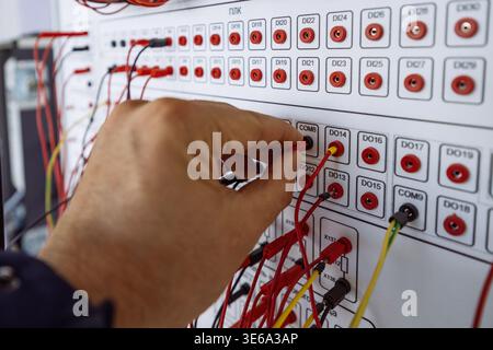 Connecting of cables, close up. Stock Photo