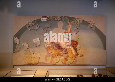 Tongeren, Belgium - 6 Apr 24: Reconstructed Roman wall fresco fragments depicting a mythological figure, exhibited at the Gallo-Roman Museum in Lyon, Stock Photo