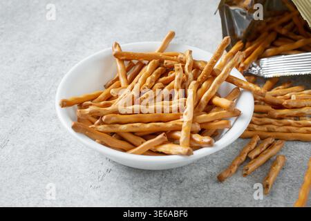 A view of a bowl of cauliflower pretzel sticks. Stock Photo