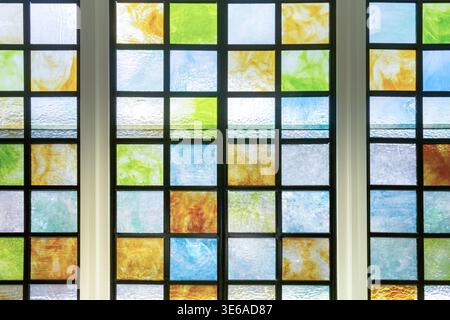 A view of stained glass windows. Stock Photo