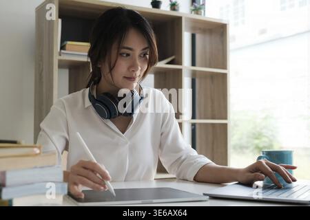User experience concept. Creative Web Designer sketching application and developing template layout on laptop, framework for digital devices Stock Photo
