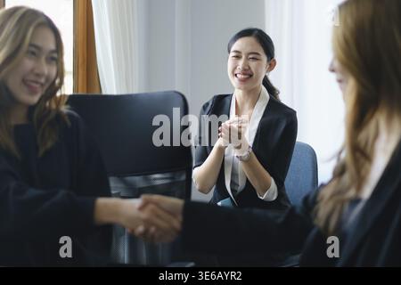 Business people shaking hands to celebration partnership and business deal, Team Working together for next year concept Stock Photo
