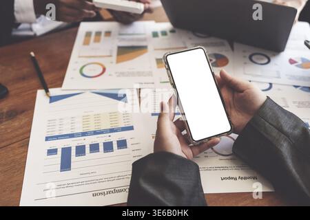 Group of Businesswoman and Accountant checking data document on digital tablet for investigation of corruption account. Anti Bribery concept Stock Photo