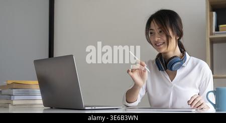 User experience concept. Creative Web Designer sketching application and developing template layout on laptop, framework for digital devices Stock Photo