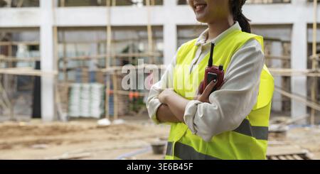 Engineers are checking the quality at the outdoors construction site Stock Photo