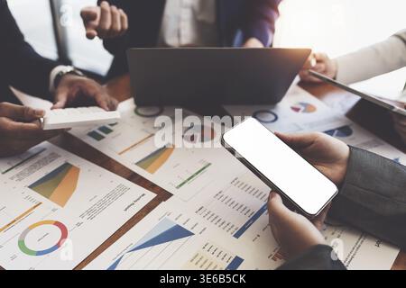 Group of Businesswoman and Accountant checking data document on digital tablet for investigation of corruption account. Anti Bribery concept Stock Photo