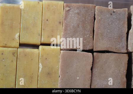 Handmade soap bars displayed in a neat arrangement Stock Photo