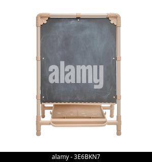 Empty kids chalkboard standing on floor. Educational writing board with shelf for chalk. Creative accessory for child development. Learning tool for s Stock Photo