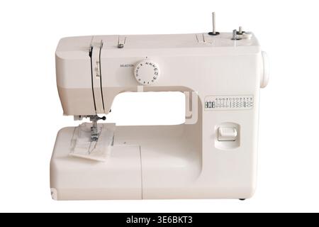 Modern sewing machine isolated on white background. Portable electronic device for textile handiwork and garment repair. Household appliance for tailo Stock Photo