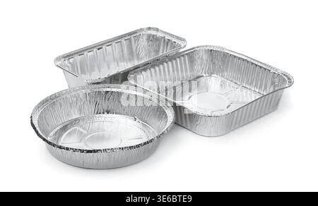 Various empty disposable aluminium foil baking dishes isolated on white Stock Photo