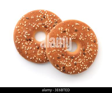 Top view of round cookies with sesame and flax seeds isolated on white Stock Photo