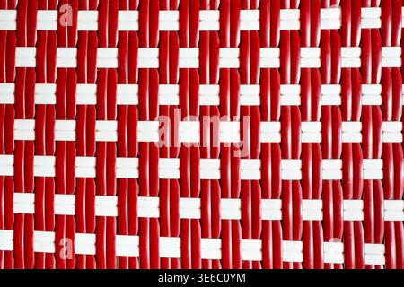 A top down view of a rattan style weave material, as a background. Stock Photo
