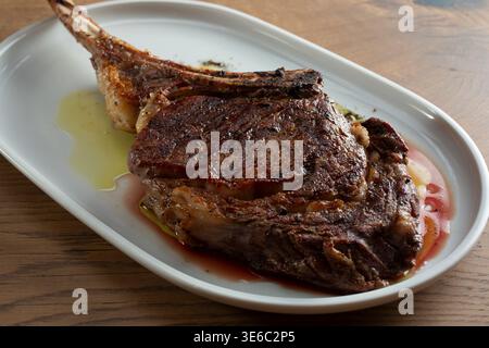 A view of a tomahawk steak. Stock Photo