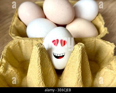 Eggs with faces Stock Photo