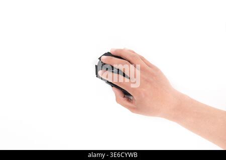 Hand holding and operating a black wireless computer mouse on a white background Stock Photo