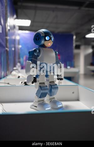 Vladikavkaz, Russia - April 06 , 2026 : Robosen Titan 40 humanoid robot on display at a robotics exhibition. Close-up of a blue and white interactive Stock Photo