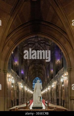 Wide view of the main reading room of the John Rylands Library, Manchester, with John Rylands statue and vaulted ceiling. Stock Photo