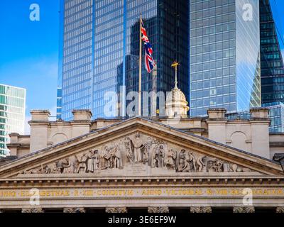 Bank Junction in London, busy city intersection with historic buildings, financial district streetscape, urban traffic and city life scene Stock Photo