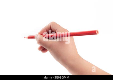 Hand holding red pencil against a clean white background, ready to write Stock Photo
