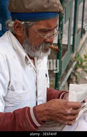 Cuba, Havana.  Bearded Man Chewing on a Cigar. Stock Photo