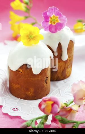 Easter cake with glace icing and flowers Stock Photo