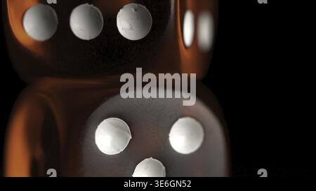 Two red casino dices on the black background. Shot glasses with dice and ribbon. risk concept - playing dice at black wooden background. Playing a gam Stock Photo