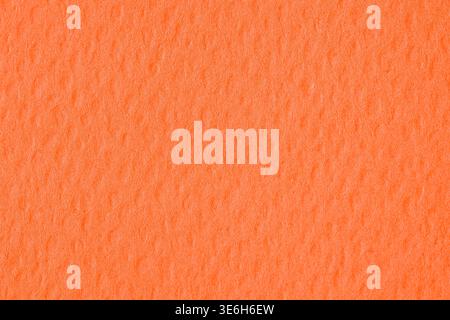 Vibrant orange textured paper background with soft grain pattern Stock Photo