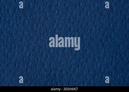 Dark blue textured paper background with rich grain detail Stock Photo