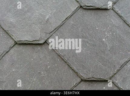 Hexagonal slate stone tile pattern background Stock Photo