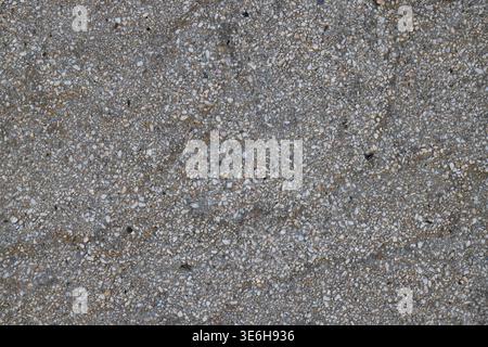Grey Pebble Dash Plaster Wall closeup Texture and background Stock Photo