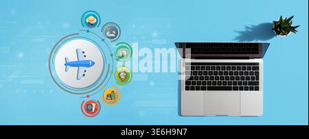 Laptop displaying airplane and travel icons, suggesting online booking and travel planning Stock Photo