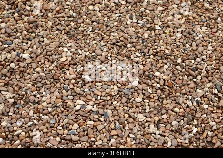 Natural brown river pebbles and gravel stones Stock Photo