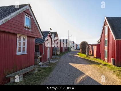 Wooden red fishing huts at the harbor of Ringk?bing, Denmark Stock Photo