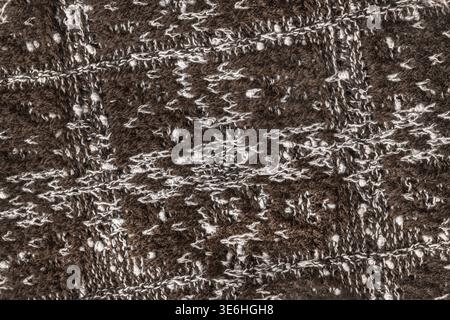 Brown and white abstract craft knit background closeup Stock Photo