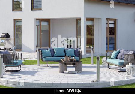 A 3D render of a modern backyard patio featuring a circular paved area, outdoor sofas with teal cushions, a central fire pit, and green grass. Stock Photo